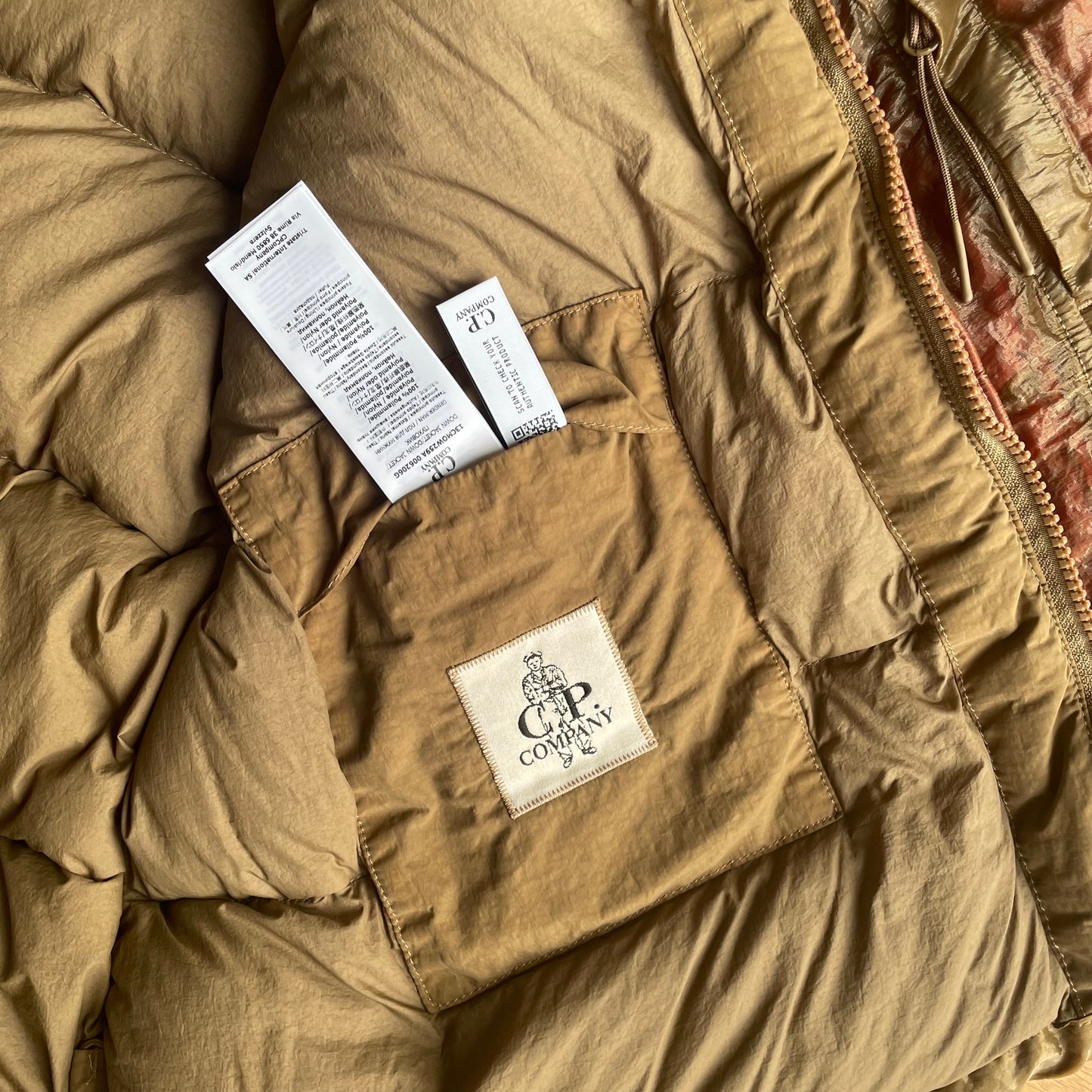 C.P. Company Kan-D Puffer Jacket in Cumin (RRP £765)