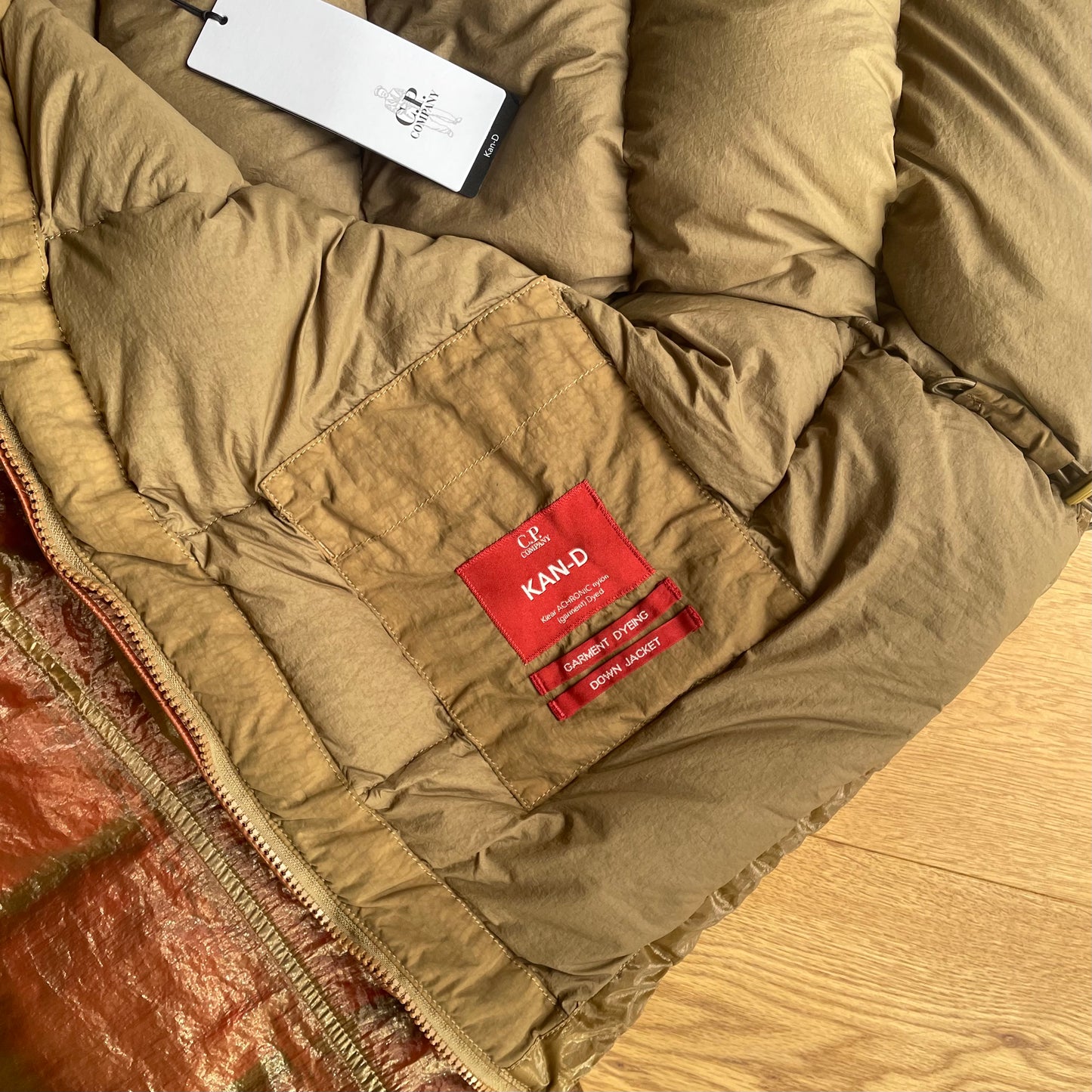 C.P. Company Kan-D Puffer Jacket in Cumin (RRP £765)