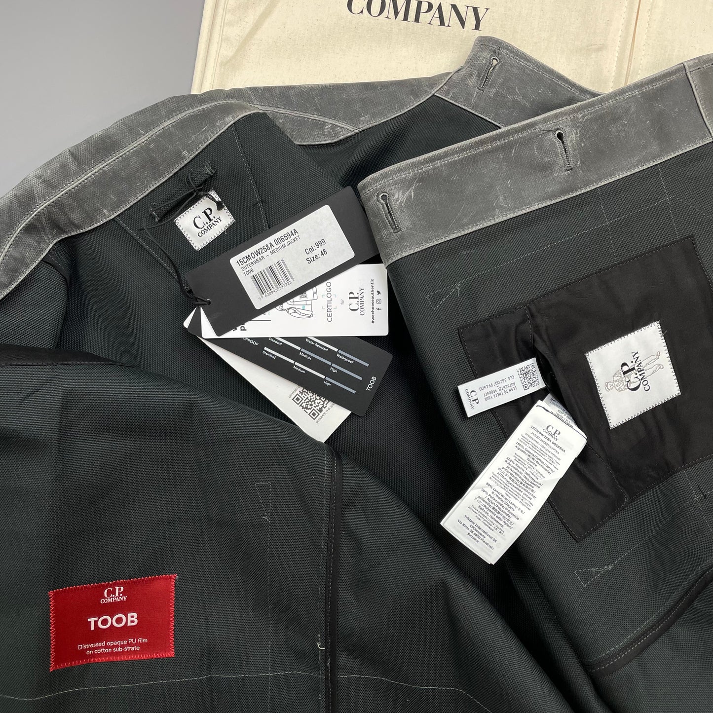 C.P. Company Grey AW24 Toob Resin Coated Wool/Nylon Spellout 3M Jacket