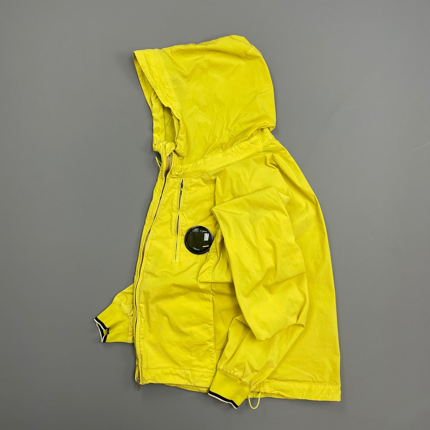 C.P. Company Yellow Nycra Nylon Chest Lens Hooded Windbreaker Jacket