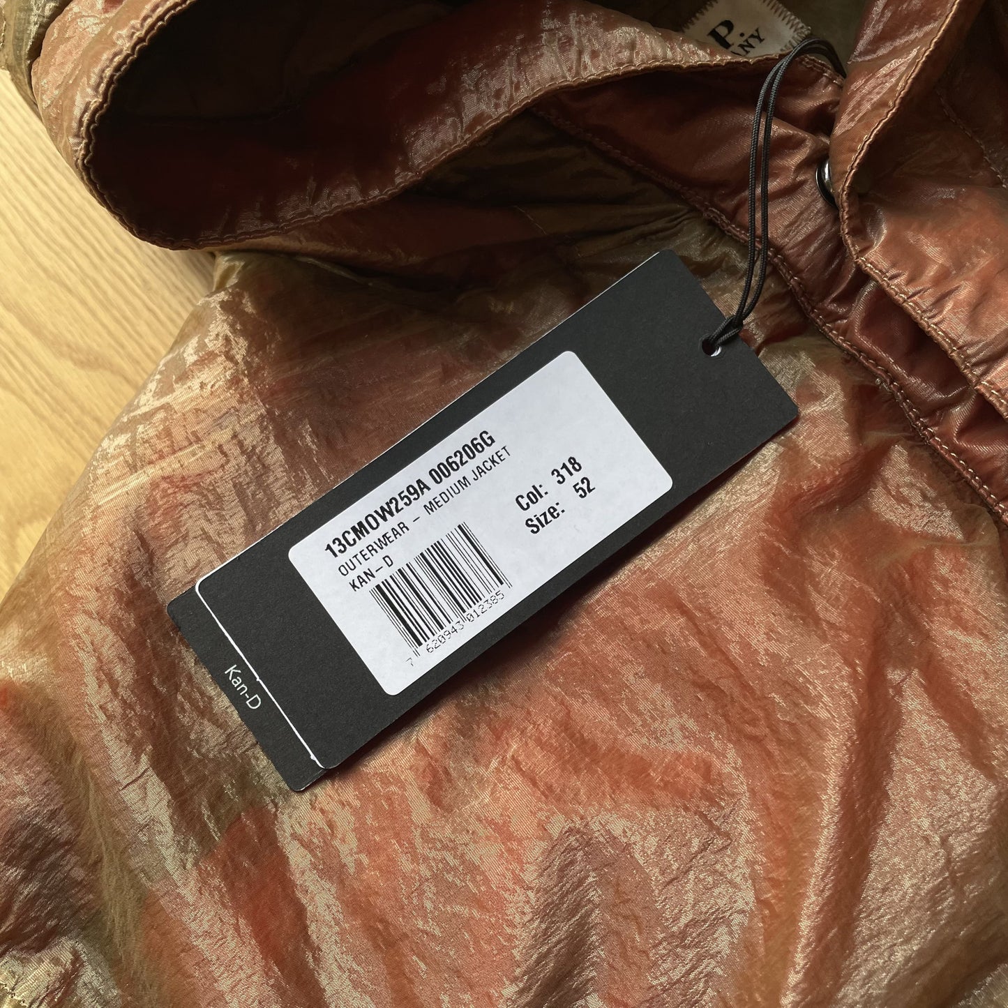 C.P. Company Kan-D Puffer Jacket in Cumin (RRP £765)