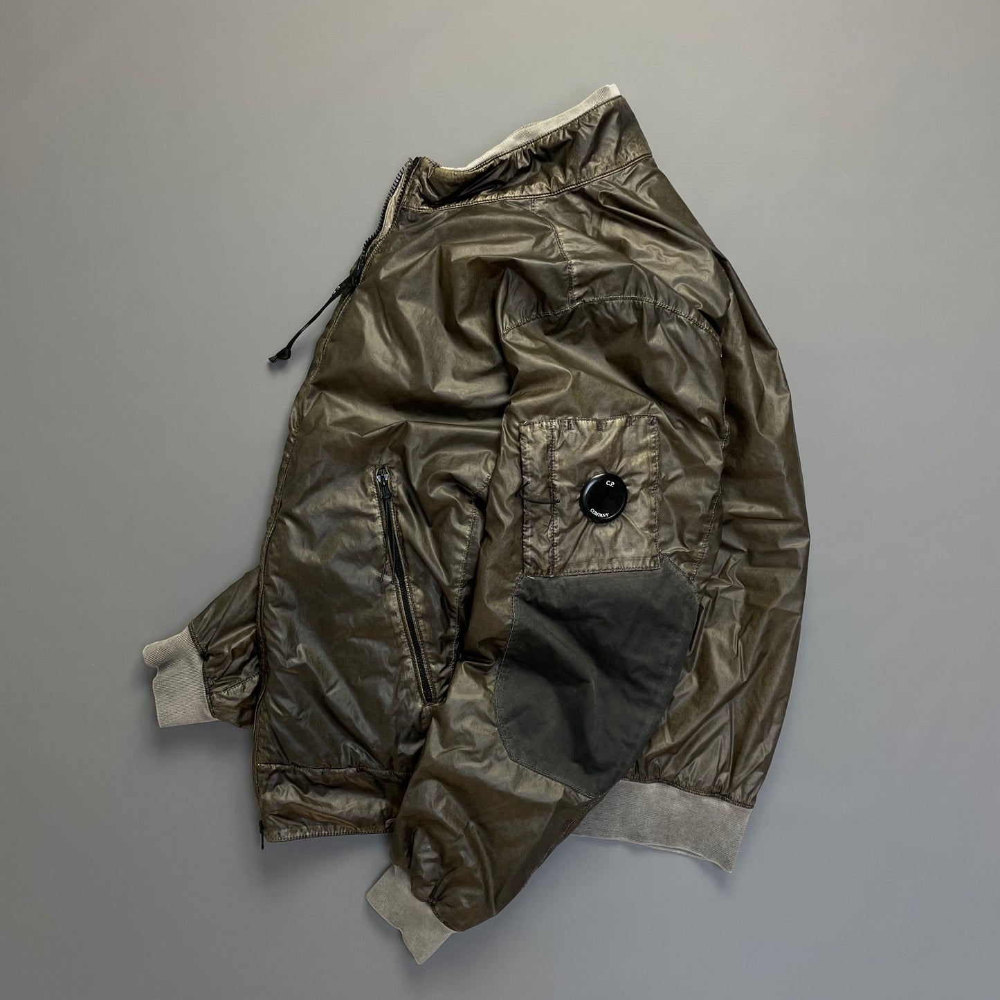 C.P. Company Nyber Bomber Jacket in Dusty Olive
