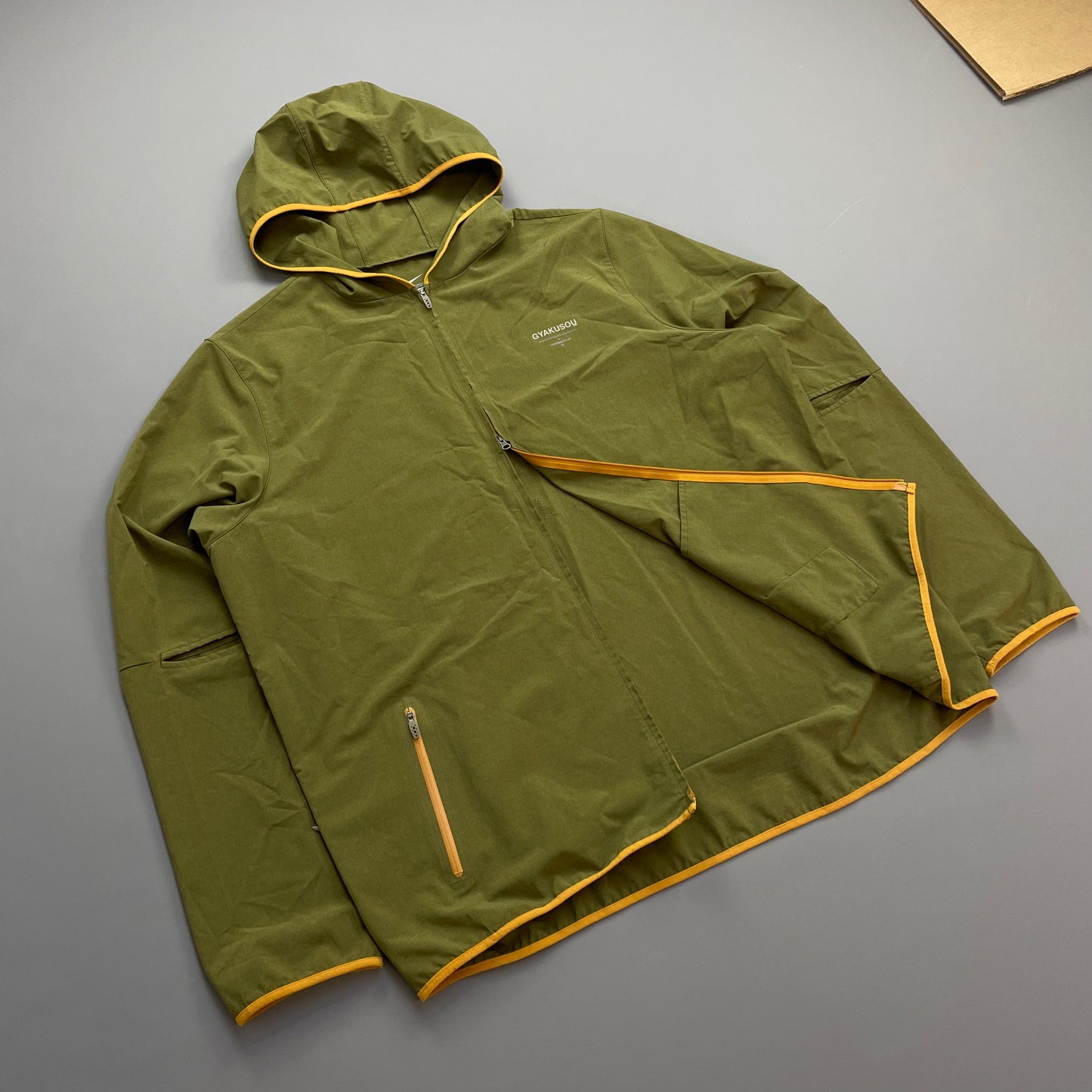 Nike Gyakusou Green Reverse Running Club Lightweight Hooded Windbreaker Jacket