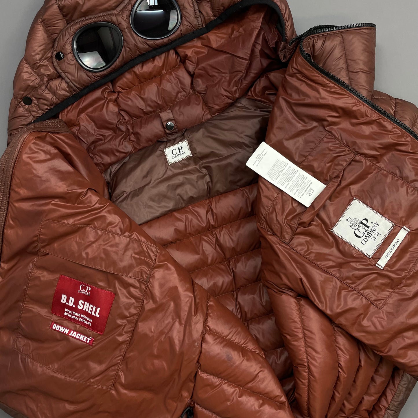 C.P. Company Rust DD Shell Goggle Puffer Jacket