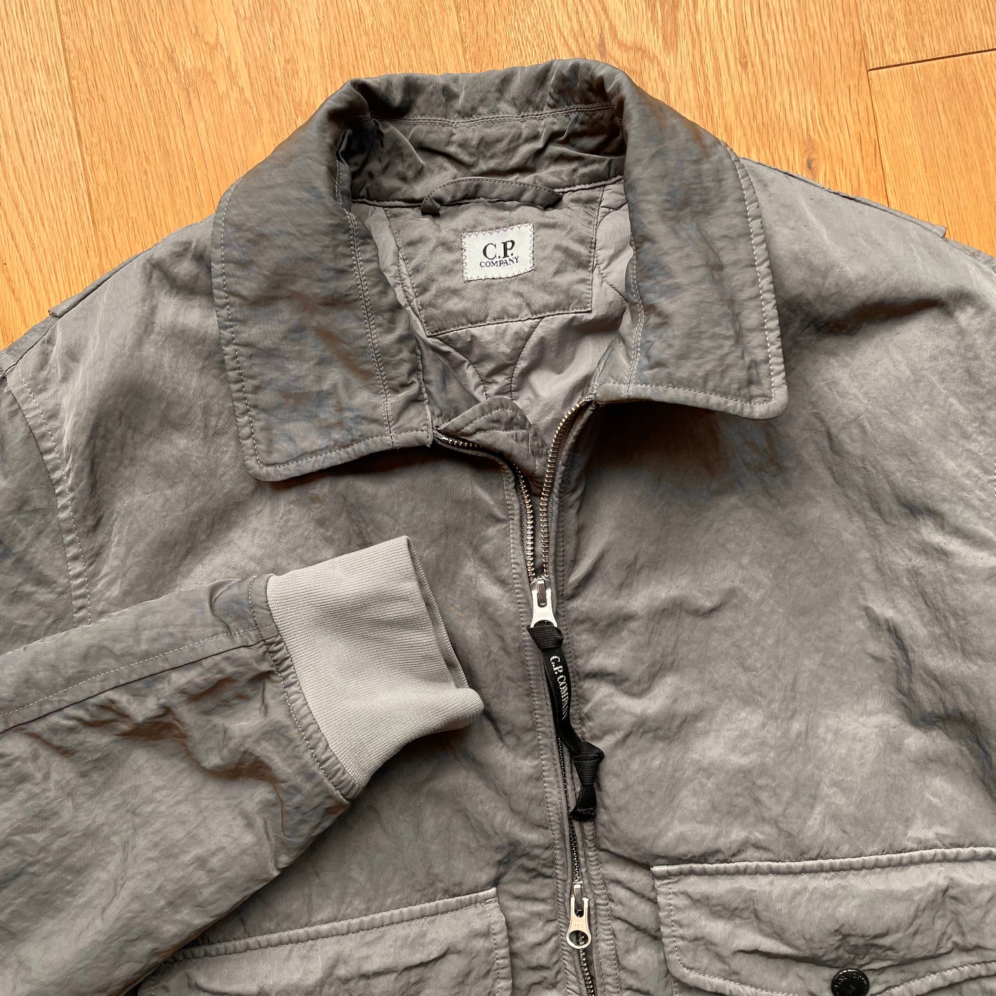 C.P. Company Nylon B Grey Shimmer Bomber Jacket