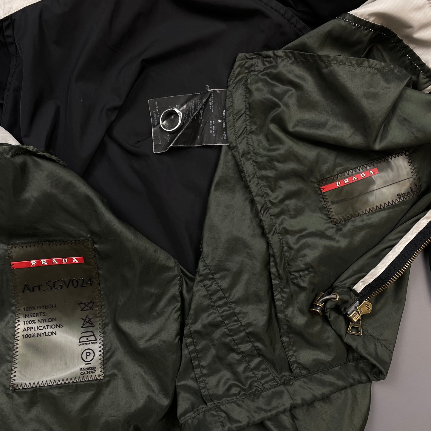 Prada Sport White Black & Green 2008 Lightweight Concealed Hood Nylon Windbreaker Jacket
