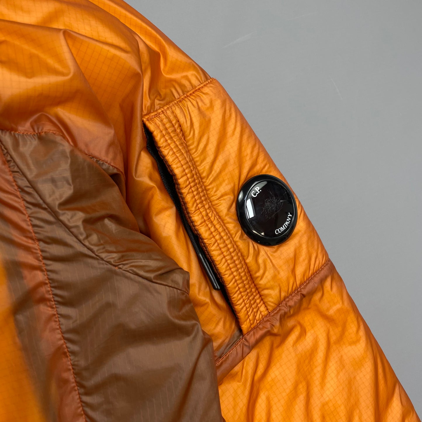 C.P. Company Orange Outline With Primaloft Technology Jacket