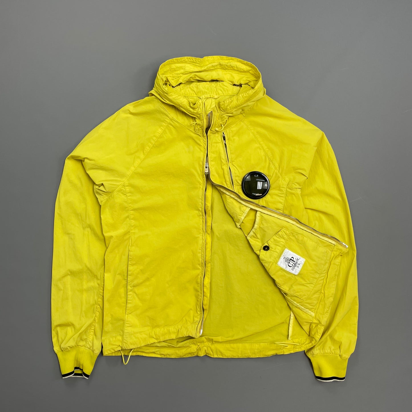 C.P. Company Yellow Nycra Nylon Chest Lens Hooded Windbreaker Jacket