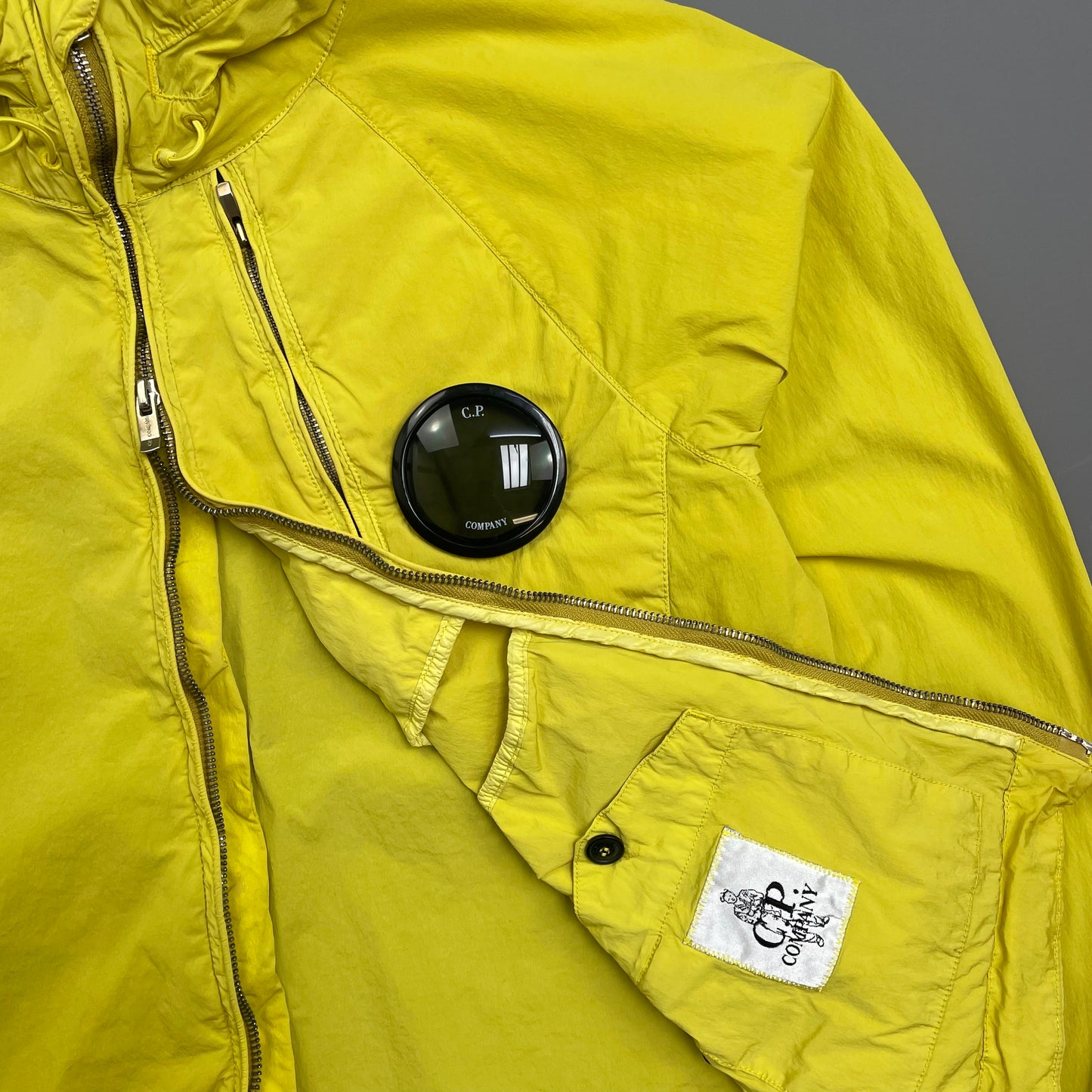 C.P. Company Yellow Nycra Nylon Chest Lens Hooded Windbreaker Jacket