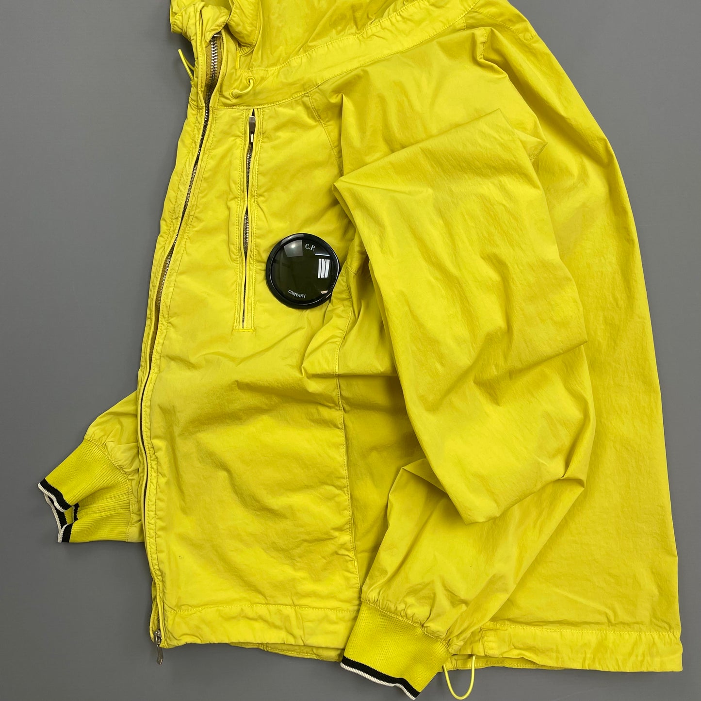 C.P. Company Yellow Nycra Nylon Chest Lens Hooded Windbreaker Jacket