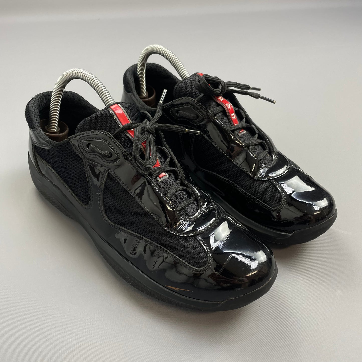 Prada Americas Cup Black Patent Leather Trainers