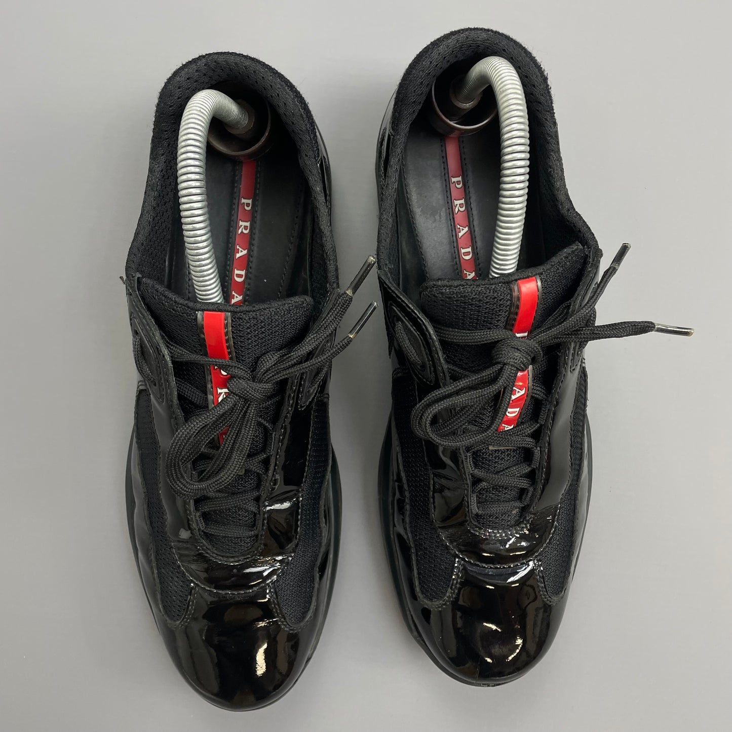 Prada Americas Cup Black Patent Leather Trainers