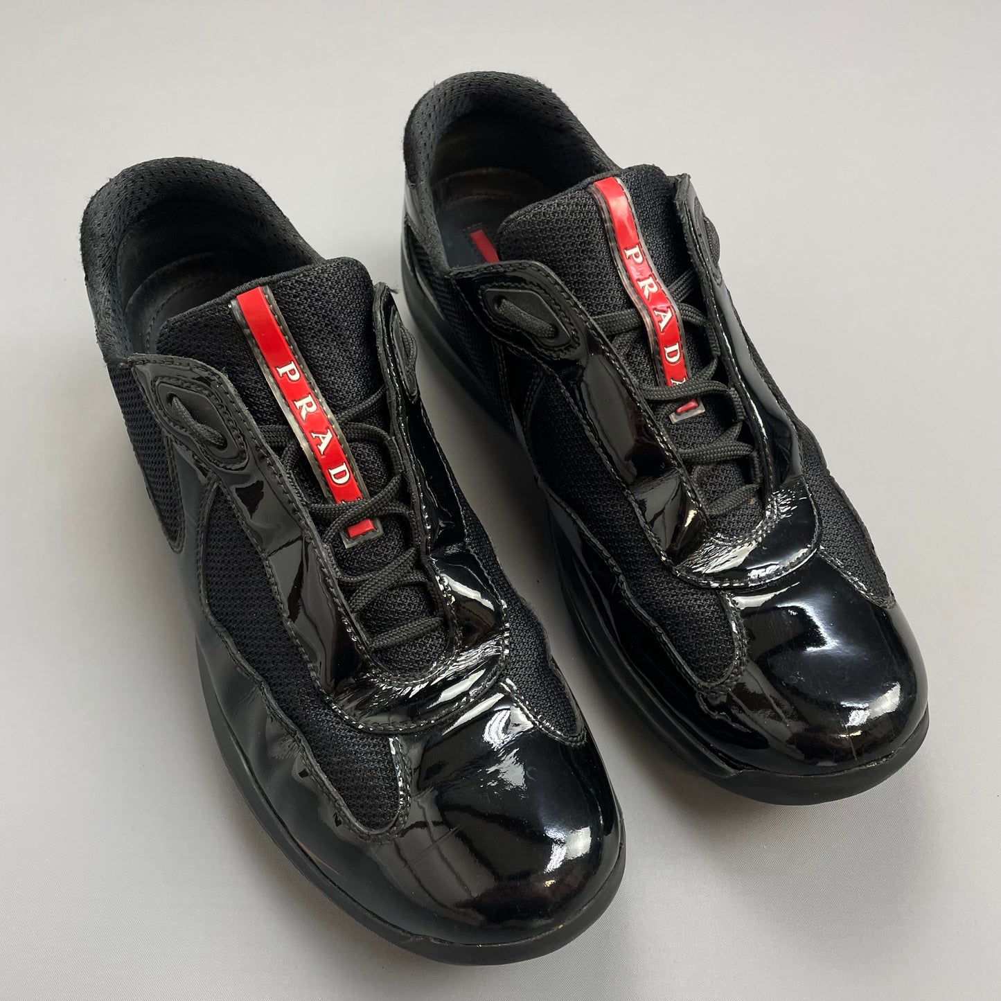 Prada Americas Cup Black Patent Leather Trainers