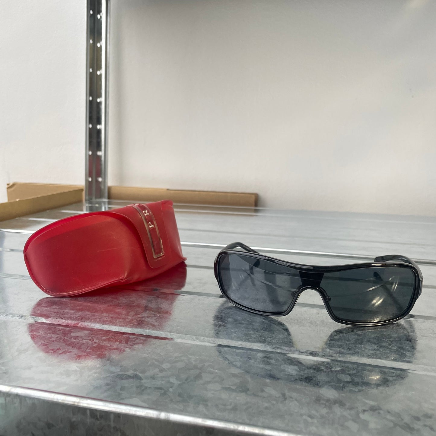 Prada Sport Black Wide Silver Accent Sunglasses