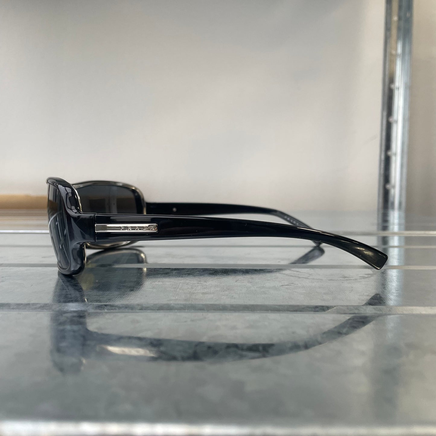 Prada Sport Black Wide Silver Accent Sunglasses